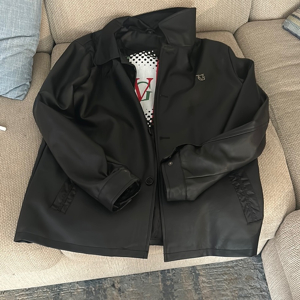 Black Raincoat with Long Sleeves and Textured Fabric